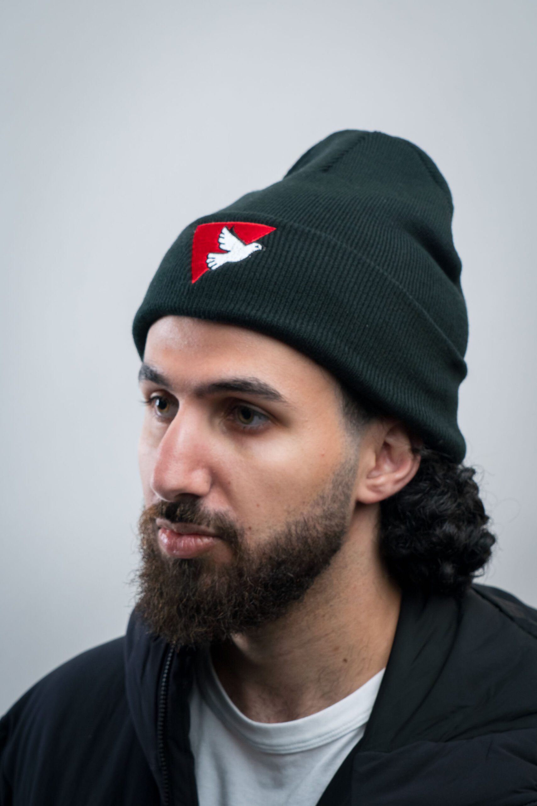 Dove Triangle Black Beanie