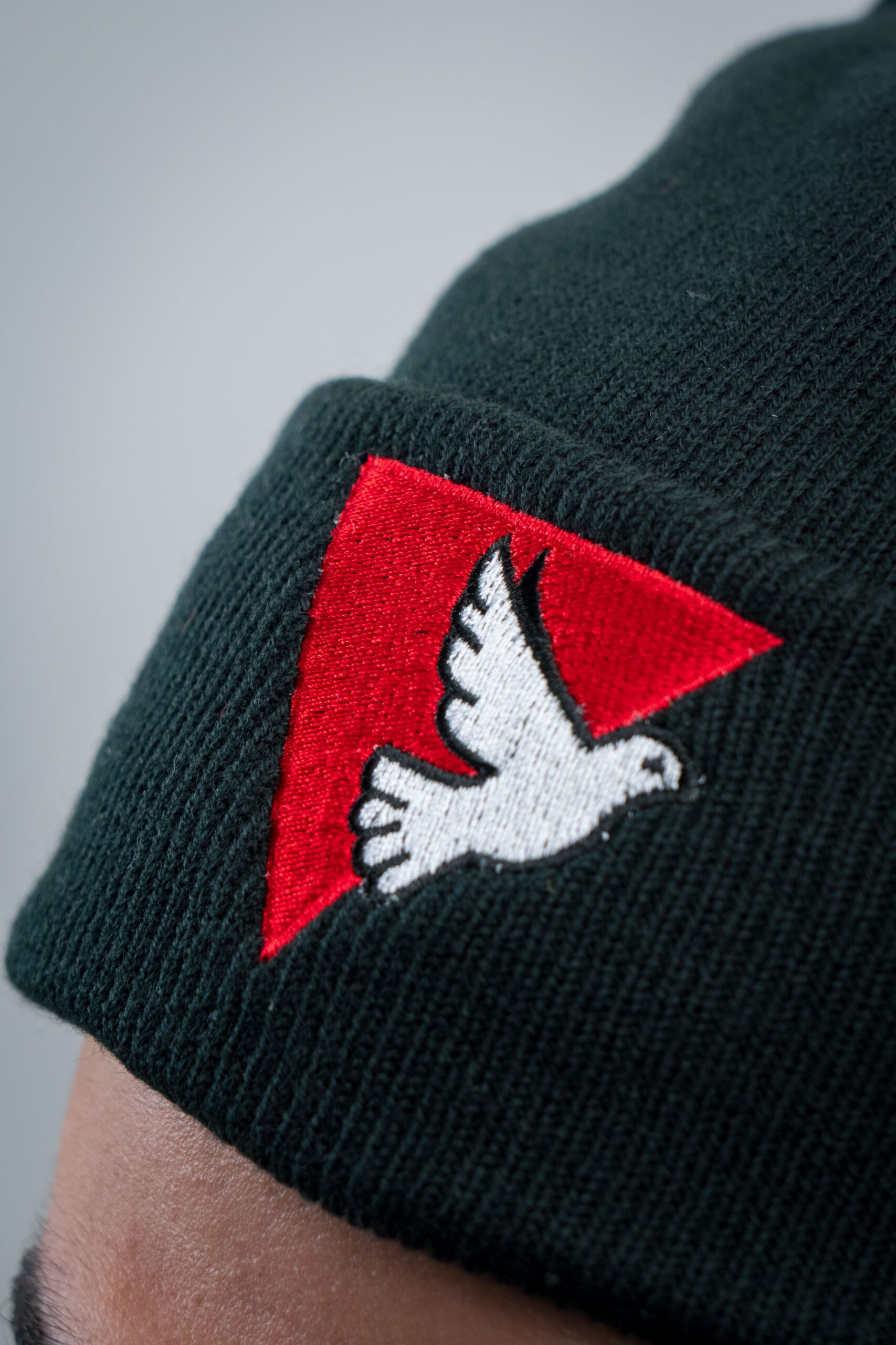 Dove Triangle Black Beanie